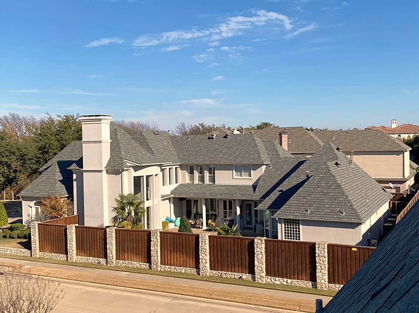 A Plano home photographed from the roof during an inspection
